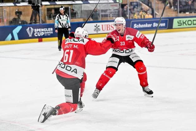 30.12.2023, Davos, Eisstadion Davos, Spengler Cup: HC Dynamo Pardubice - Team Canada, 33 Jan Kostalek (Dynamo Pardubice) and 61 Martin Kaut (Dynamo Pardubice) celebrate a goal Davos Eisstadion Davos Graubünden Switzerland Copyright: xJustPictures.ch AndreaxBrancax jp-en-AnBr-AB_30122023_AAB_6269