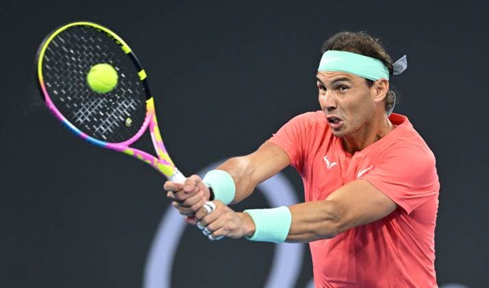 TENNIS BRISBANE INTERNATIONAL, Rafael Nadal of Spain in action during his doubles match with partner Marc Lopez of Spain against Max Purcell and Jordan Thompson of Australia during their round 1 doubles match on Day 1 of the 2024 Brisbane International at the Queensland Tennis Centre in Brisbane, Sunday, December 31, 2023. ( NO ARCHIVING, EDITORIAL USE ONLY, NO USE IN BOOKS WITHOUT CONSENT BRISBANE QUEENSLAND AUSTRALIA  Copyright: xDARRENxENGLANDx 20231231001883583190