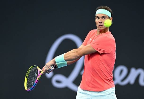 TENNIS BRISBANE INTERNATIONAL, Rafael Nadal of Spain in action during his doubles match with partner Marc Lopez of Spain against Max Purcell and Jordan Thompson of Australia during their round 1 doubles match on Day 1 of the 2024 Brisbane International at the Queensland Tennis Centre in Brisbane, Sunday, December 31, 2023. ( NO ARCHIVING, EDITORIAL USE ONLY, NO USE IN BOOKS WITHOUT CONSENT BRISBANE QUEENSLAND AUSTRALIA  Copyright: xDARRENxENGLANDx 20231231001883583234