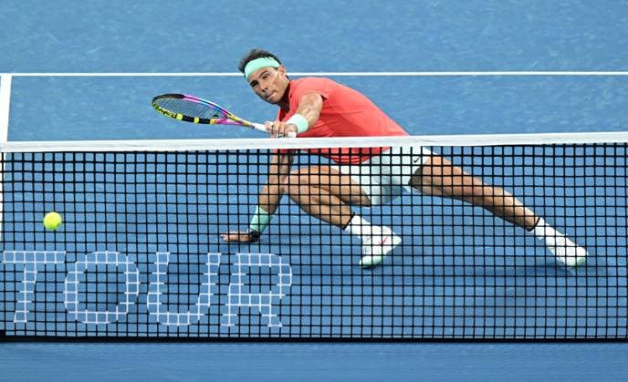 TENNIS BRISBANE INTERNATIONAL, Rafael Nadal of Spain in action during his doubles match with partner Marc Lopez of Spain against Max Purcell and Jordan Thompson of Australia during their round 1 doubles match on Day 1 of the 2024 Brisbane International at the Queensland Tennis Centre in Brisbane, Sunday, December 31, 2023. ( NO ARCHIVING, EDITORIAL USE ONLY, NO USE IN BOOKS WITHOUT CONSENT BRISBANE QUEENSLAND AUSTRALIA  Copyright: xDARRENxENGLANDx 20231231001883588796