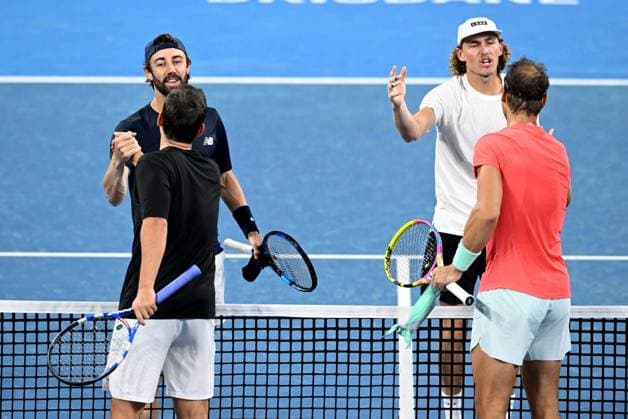 TENNIS BRISBANE INTERNATIONAL, Jordan Thompson (left) and Max Purcell (right) of Australia are seen with Marc Lopez (left) and Rafael Nadal (right) of Spain during the round 1 doubles match on Day 1 of the 2024 Brisbane International at the Queensland Tennis Centre in Brisbane, Sunday, December 31, 2023. ( NO ARCHIVING, EDITORIAL USE ONLY, NO USE IN BOOKS WITHOUT CONSENT BRISBANE QUEENSLAND AUSTRALIA  Copyright: xDARRENxENGLANDx 20231231001883590811