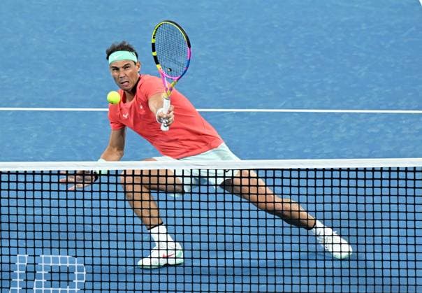 TENNIS BRISBANE INTERNATIONAL, Rafael Nadal of Spain in action during his doubles match with partner Marc Lopez of Spain against Max Purcell and Jordan Thompson of Australia during their round 1 doubles match on Day 1 of the 2024 Brisbane International at the Queensland Tennis Centre in Brisbane, Sunday, December 31, 2023. ( NO ARCHIVING, EDITORIAL USE ONLY, NO USE IN BOOKS WITHOUT CONSENT BRISBANE QUEENSLAND AUSTRALIA  Copyright: xDARRENxENGLANDx 20231231001883594384