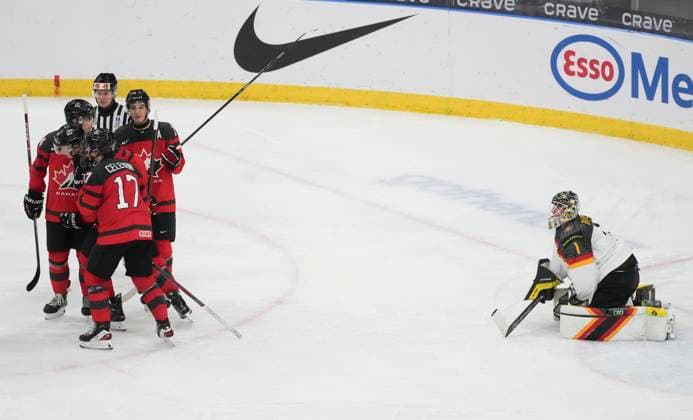 December 31, 2023, GOTHENBURG, SWEDEN: Germany goaltender Matthias Bittner (1) watches as Canada s Jordan Dumais (22) celebrates his goal with teammates during third period hockey action at the IIHF World Junior Hockey Championship in Gothenburg, Sweden, Sunday, Dec. 31, 2023. Canada News - December 31, 2023  - ZUMAc35_ 20231231_zaf_c35_024 Copyright: xChristinnexMuschix