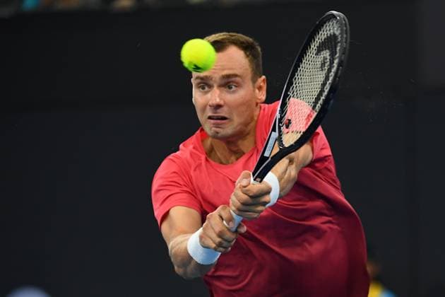TENNIS BRISBANE INTERNATIONAL, Roman Safiullin in action against Ben Shelton during their round one match on Day 2 of the 2024 Brisbane International at the Queensland Tennis Centre in Brisbane, Monday, January 1, 2024. NO ARCHIVING, EDITORIAL USE ONLY, NO USE IN BOOKS WITHOUT CONSENT BRISBANE QUEENSLAND AUSTRALIA  Copyright: xJONOxSEARLEx 20240101001883860266