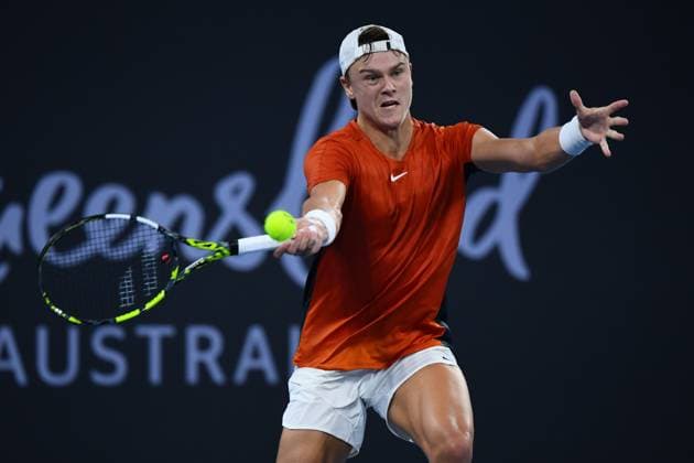 TENNIS BRISBANE INTERNATIONAL, Holger Rune in action against Max Purcell during their round one match on Day 2 of the 2024 Brisbane International at the Queensland Tennis Centre in Brisbane, Monday, January 1, 2024. NO ARCHIVING, EDITORIAL USE ONLY, NO USE IN BOOKS WITHOUT CONSENT BRISBANE QUEENSLAND AUSTRALIA  Copyright: xJONOxSEARLEx 20240101001883882176