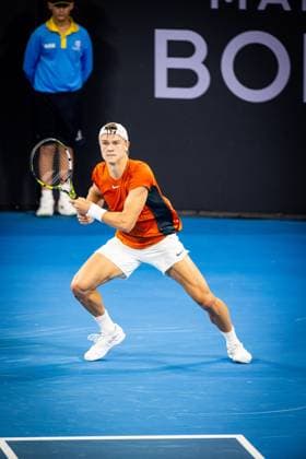 Holger Rune of Denmark playing Australia s Max Purcell Photo: Ben Symons SHUTTER STOCK Brisbane International Tennis Tournament, Day Two, Queensland Tennis Centre, Brisbane, Australia - 01 Jan 2024  Copyright: xBenxSymons Shutterstockx 14279941ac