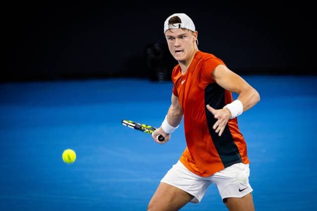 Holger Rune of Denmark playing Australia s Max Purcell Photo: Ben Symons SHUTTER STOCK Brisbane International Tennis Tournament, Day Two, Queensland Tennis Centre, Brisbane, Australia - 01 Jan 2024  Copyright: xBenxSymons Shutterstockx 14279941aj