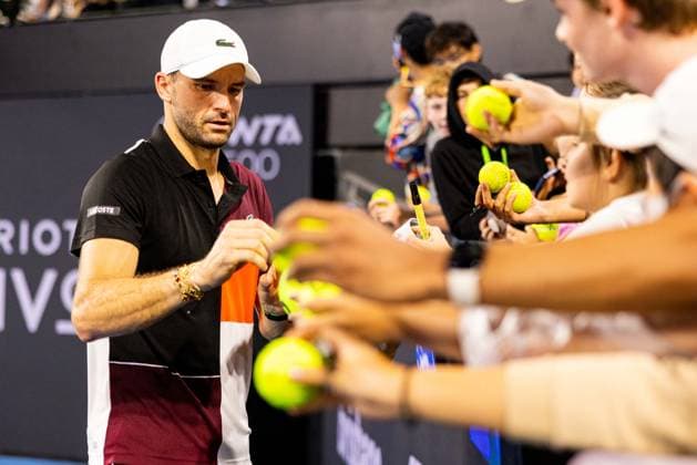 Grigor Dimitrovsigns for the fans after his win in the first round of the Brisbane International 1st January 2024 Brisbane International Tennis Tournament, Day Two, Queensland Tennis Centre, Brisbane, Australia - 01 Jan 2024  Copyright: xBenxSymons Shutterstockx 14279941ew