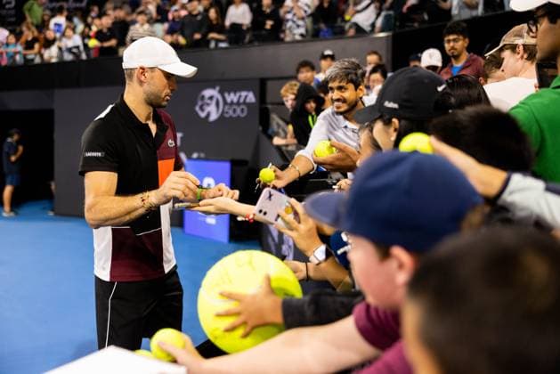 Grigor Dimitrovsigns for the fans after his win in the first round of the Brisbane International 1st January 2024 Brisbane International Tennis Tournament, Day Two, Queensland Tennis Centre, Brisbane, Australia - 01 Jan 2024  Copyright: xBenxSymons Shutterstockx 14279941ex