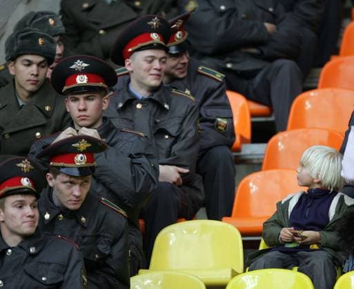 A small child admires the police A small child admires the police.Euro 2008 Qualifier.Russia v England.1st January, 1970.--------------------.Sportimage +44 Image: PHOTOGRAPHER Cal Media) United States EDITORIAL USE ONLY Copyright: xx DavidxKleinx csmphoto165971