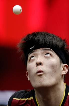 Sport Themen der Woche KW01 Sport Bilder des Tages (240104) -- DOHA, Jan. 4, 2024 -- Qiu Dang serves during the men s singles quarterfinal between Liang Jingkun of China and Qiu Dang of Germany at WTT Finals Men Doha 2023 Table tennis, Tischtennis tournament in Doha, Qatar, Jan. 4, 2024. ) (SP)QATAR-DOHA-TABLE TENNIS-WTT FINALS MEN-QUARTERFINALS WangxDongzhen 