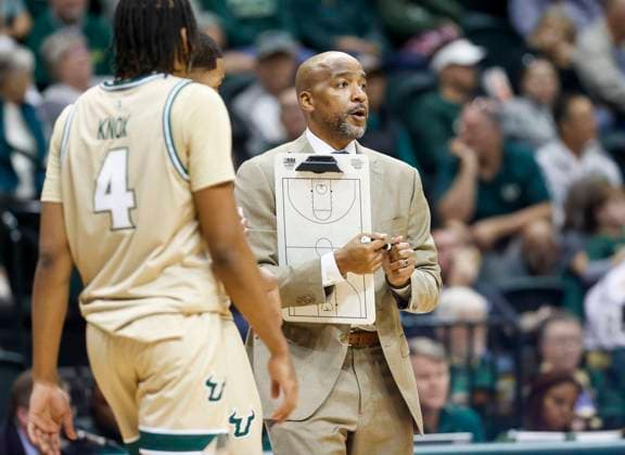 January 4, 2024, Tampa, Florida, USA: South Florida Bulls head coach Amir Abdur-Rahim approaches team on the court to huddle during a break in the second half against the Temple Owls at Yuengling Center in Tampa on Thursday, Jan. 4, 2024. Tampa USA - ZUMAs70_ 0383357291st Copyright: xIvyxCeballox