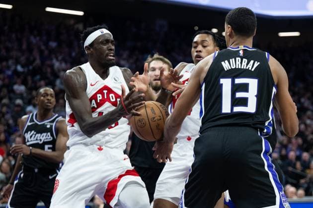 January 5, 2024, Sacramento, CA, USA: Toronto Raptors forward Pascal Siakam (43)battles for ball after Sacramento Kings forward Keegan Murray (13) stripped the ball from him during an NBA, Basketball Herren, USA game at Golden 1 Center on Friday, Jan. 5, 2024. Sacramento USA - ZUMAj89_ 20240105_zaf_j89_020 Copyright: xPaulxKitagakixJr.x