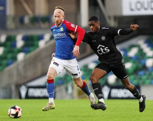 Clearwater Irish Cup Fifth Round, Windsor Park, Belfast 6 1 2024 Linfield FC vs Warrenpoint Town Linfield™s Michael Newberry with Warrenpoint™s Dauda Shotayo Michael Newberry with Dauda Shotayo 6 1 2024  Copyright: x INPHO JonathanxPorterx 060124JP1football020