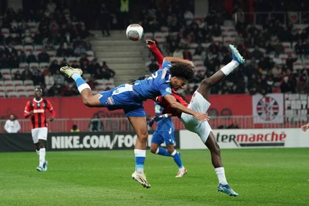Sport Bilder des Tages Jordan Lotomba (OGC Nice) - Clement Akpa (AJ Auxerre) FOOTBALL : OGC Nice vs AJ Auxerre - 32e de finale de Coupe de France - Nice - 06 01 2024 NorbertScanella Panoramic 