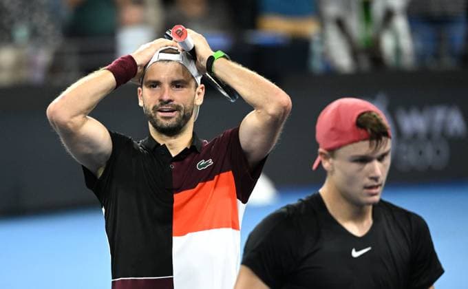 TENNIS BRISBANE INTERNATIONAL, Grigor Dimitrov (left) of Belarus celebrates winning against Holger Rune (right) of Denmark during the men?s Final on Day 8 of the 2024 Brisbane International at the Queensland Tennis Centre in Brisbane, Sunday, January 7, 2024. ( NO ARCHIVING, EDITORIAL USE ONLY, NO USE IN BOOKS WITHOUT CONSENT BRISBANE QUEENSLAND AUSTRALIA  Copyright: xDARRENxENGLANDx 20240107001885878998