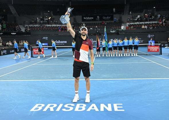 TENNIS BRISBANE INTERNATIONAL, Grigor Dimitrov of Bulgaria celebrates winning with the trophy after winning the men?s Final against Holger Rune of Denmark on Day 8 of the 2024 Brisbane International at the Queensland Tennis Centre in Brisbane, Sunday, January 7, 2024. ( NO ARCHIVING, EDITORIAL USE ONLY, NO USE IN BOOKS WITHOUT CONSENT BRISBANE QUEENSLAND AUSTRALIA  Copyright: xDARRENxENGLANDx 20240107001885883161