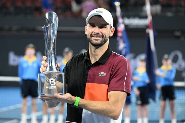 TENNIS BRISBANE INTERNATIONAL, Grigor Dimitrov of Bulgaria celebrates winning with the trophy after winning the men?s Final against Holger Rune of Denmark on Day 8 of the 2024 Brisbane International at the Queensland Tennis Centre in Brisbane, Sunday, January 7, 2024. ( NO ARCHIVING, EDITORIAL USE ONLY, NO USE IN BOOKS WITHOUT CONSENT BRISBANE QUEENSLAND AUSTRALIA  Copyright: xDARRENxENGLANDx 20240107001885884043