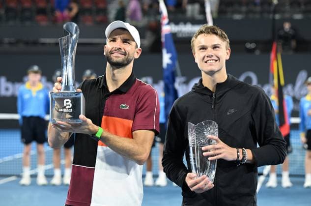 TENNIS BRISBANE INTERNATIONAL, Grigor Dimitrov (left) of Belarus and Holger Rune (right) of Denmark are seen during the trophy presentation after the men?s Final on Day 8 of the 2024 Brisbane International at the Queensland Tennis Centre in Brisbane, Sunday, January 7, 2024. ( NO ARCHIVING, EDITORIAL USE ONLY, NO USE IN BOOKS WITHOUT CONSENT BRISBANE QUEENSLAND AUSTRALIA  Copyright: xDARRENxENGLANDx 20240107001885891946