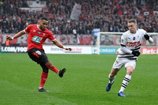 Sivis Maxime ( 2 - Guingamp ) and Truffert Adrien ( 3 - Rennes ) during the French Cup match between EA Guingamp and Stade Rennais at Stade du Roudourou on January 07, 2024 in Guingamp, France. ( Photo by federico pestellini panoramic ) - FOOTBALL : Guingamp vs Rennes - Coupe de France - 07 01 2024 FedericoPestellini Panoramic 