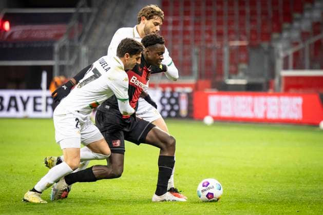 Testspiel, Bayer 04 Leverkusen - FC Venedig, 07.01.2024 Antonio Candela (FC Venedig, 27) und Noah Mbamba (Bayer 04 Leverkusen, Nr. 18); Leverkusen, 07.01.2024: Testspiel, Bayer 04 Leverkusen - FC Venedig, BayArena, Leverkusen. DFL REGULATIONS PROHIBIT ANY USE OF PHOTOGRAPHS AS IMAGE SEQUENCES AND OR QUASI-VIDEO. Copyright: xBEAUTIFULxSPORTS LeahxKohringx