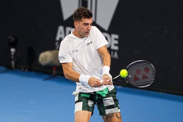 TENNIS ADELAIDE INTERNATIONAL, Thanasi Kokkinakis of Australia in action against DuÅ¡an LajoviÄ? of Serbia during their round of 32 match of the 2024 Adelaide International at Memorial Drive Tennis Centre in Adelaide, Monday, January 8, 2024. ( NO ARCHIVING, EDITORIAL USE ONLY, NO USE IN BOOKS WITHOUT CONSENT ADELAIDE SOUTH AUSTRALIA AUSTRALIA  Copyright: xMATTxTURNERx 20240108001886386176