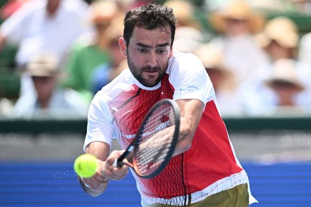 TENNIS KOOYONG CLASSIC, Marin Cilic of Croatia in action against Andy Murray of Great Britain during their match in the 2024 Kooyong Classic at the Kooyong Lawn Tennis Club in Melbourne, Wednesday, January 10, 2024. ( NO ARCHIVING, EDITORIAL USE ONLY, NO USE IN BOOKS WITHOUT CONSENT MELBOURNE VICTORIA AUSTRALIA  Copyright: xJOELxCARRETTx 20240110001887037367