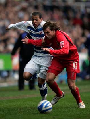 Coca Cola Championship Soccer: Reading v Ipswich Town MAR 14 Liam Rosenior of Reading tries to get by Luciano Civelli of Ipswich Town..Coca Cola Championship..Reading v Ipswich Town..14th March, 2009.(Credit Image: Â PHOTOGRAPHER Sportimage Cal Media) UK EDITORIAL USE ONLY Copyright: xx 20090314_zaf_si1_072.jpg JakexBadgerx csmphoto218014