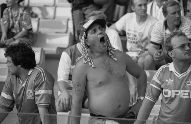 June 11-30, 1990. Italy. Irish fans in the stands watch a group stage match of the 1990 FIFA World Cup, WM, Weltmeisterschaft, Fussball The exact date of the photograph is unknown. Igor Utkin TASS  32127224