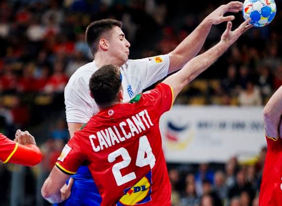Greece s Achilleas Toskas and Portugal s Alexandre Cavalcanti during the EHF Euro 2024 mens match between Greece and Portugal at the Olympiahalle in Munich, Germany, Thursday January 11, 2024 , Munich Tyskland Copyright: Ritzau Scanpix LiselottexSabroex spdk20240111-192411-L