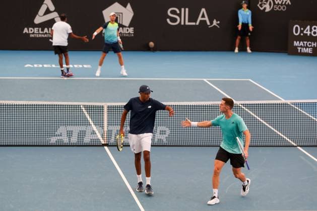 TENNIS ADELAIDE INTERNATIONAL, Rajeev Ram of the United States and Joe Salisbury of the United Kingdom in action against Rohan Bopanna of India and Matthew Ebden of Australia during the Mens Doubles Final match of the 2024 Adelaide International at Memorial Drive Tennis Centre in Adelaide, Saturday, January 13, 2024. ( NO ARCHIVING, EDITORIAL USE ONLY, NO USE IN BOOKS WITHOUT CONSENT ADELAIDE SOUTH AUSTRALIA AUSTRALIA  Copyright: xMATTxTURNERx 20240113001888311405
