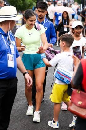 January 13, 2024, Melbourne, Victoria, Australia: MELBOURNE, AUSTRALIA - JANUARY 13: Emma Raducanu of United Kingdom meets fans after a practice session ahead of the 2024 Australian Open at Melbourne Park on January 13, 2024 in Melbourne, Australia. Melbourne Australia - ZUMAp121 20240113_zsp_p121_016 Copyright: xChrisxPutnamx