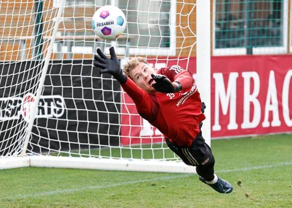 13.01.2024 - Fussball - 2. Fussball-Bundesliga - Saison 2023 2024 - 1. FC Nürnberg FCN Club - Trainingslager Winter Wintertrainingslager Marbella Spanien - Sportfoto Zink DaMa - xdaxmax - Nicolas Ortegel (1. FC Nürnberg FCN ) wirft sich nach Ball