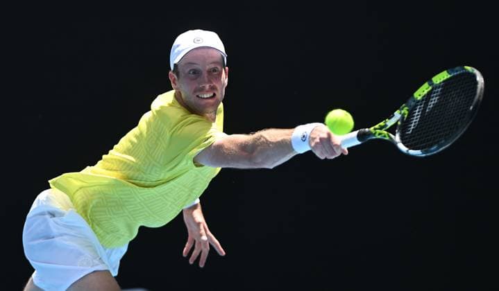 TENNIS AUSTRALIAN OPEN, Botic van de Zandschulp of Netherlands returns during his first round match against Jannik Sinner of Italy on Day 1 of the 2024 Australian Open at Melbourne Park in Melbourne, Sunday, January 14, 2024. ( NO ARCHIVING, EDITORIAL USE ONLY, NO USE IN BOOKS WITHOUT CONSENT MELBOURNE VICTORIA AUSTRALIA  Copyright: xLUKASxCOCHx 20240114001888751944