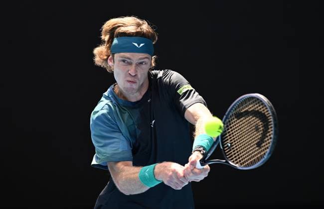 TENNIS AUSTRALIAN OPEN, Andrey Rublev of Russia returns to Thiago Seyboth Wild of Brazil on Day 1 of the 2024 Australian Open at Melbourne Park in Melbourne, Sunday, January 14, 2024. ( NO ARCHIVING, EDITORIAL USE ONLY, NO USE IN BOOKS WITHOUT CONSENT MELBOURNE VICTORIA AUSTRALIA  Copyright: xJOELxCARRETTx 20240114001888760953
