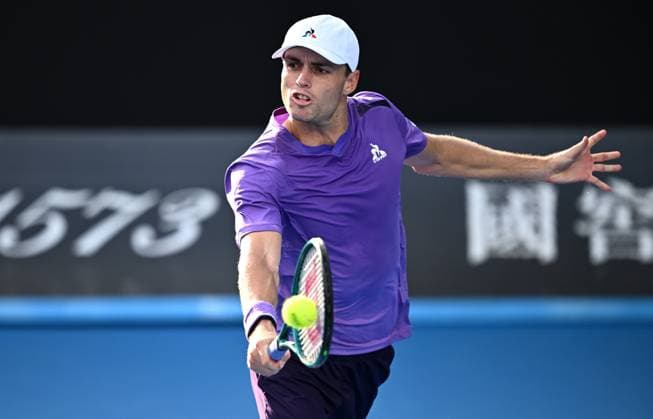 TENNIS AUSTRALIAN OPEN, Christopher O?Connell of Australia returns during his first round match against Cristian Garin of Chile on Day 1 of the 2024 Australian Open at Melbourne Park in Melbourne, Sunday, January 14, 2024. ( NO ARCHIVING, EDITORIAL USE ONLY, NO USE IN BOOKS WITHOUT CONSENT MELBOURNE VICTORIA AUSTRALIA  Copyright: xJOELxCARRETTx 20240114001888795264