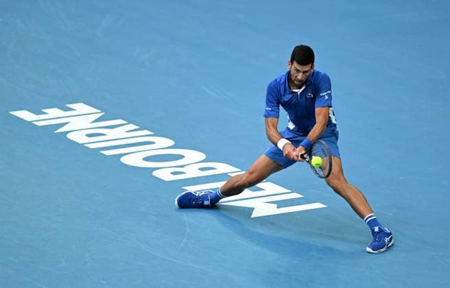 TENNIS AUSTRALIAN OPEN, Novak Djokovic of Serbia returns during his first round match against Dino Prizmic of Croatia on Day 1 of the 2024 Australian Open at Melbourne Park in Melbourne, Sunday, January 14, 2024. ( NO ARCHIVING, EDITORIAL USE ONLY, NO USE IN BOOKS WITHOUT CONSENT MELBOURNE VICTORIA AUSTRALIA  Copyright: xLUKASxCOCHx 20240114001888795966