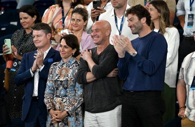 TENNIS AUSTRALIAN OPEN, Former grand slam player Andre Agassi (centre) looks on during the first round match between Novak Djokovic of Serbia and Dino Prizmic of Croatia on Day 1 of the 2024 Australian Open at Melbourne Park in Melbourne, Sunday, January 14, 2024. ( NO ARCHIVING, EDITORIAL USE ONLY, NO USE IN BOOKS WITHOUT CONSENT MELBOURNE VICTORIA AUSTRALIA  Copyright: xLUKASxCOCHx 20240114001888868516
