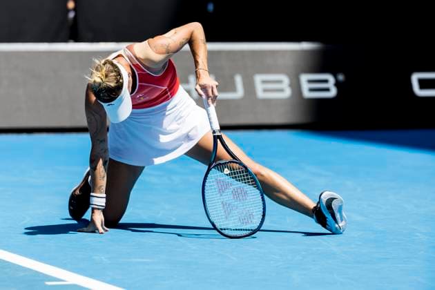 MELBOURNE, VIC - JANUARY 15: Marketa Vondrousova of the Czech Republic falls to the ground after a period of play during Round 1 of the 2024 Australian Open on January 15 2024, at Melbourne Park in Melbourne, Australia. (Photo by Jason Heidrich Icon Sportswire) TENNIS: JAN 15 Australian Open EDITORIAL USE ONLY Icon240115041