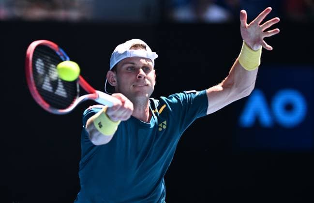 TENNIS AUSTRALIAN OPEN, Zizou Bergs of Belgium returns during his first round match against Stefanos Tsitsipas of Greece on Day 2 of the 2024 Australian Open at Melbourne Park in Melbourne, Monday, January 15, 2024. ( NO ARCHIVING, EDITORIAL USE ONLY, NO USE IN BOOKS WITHOUT CONSENT MELBOURNE VICTORIA AUSTRALIA  Copyright: xJOELxCARRETTx 20240115001889197886