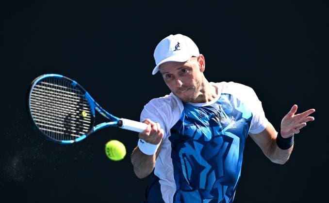 TENNIS AUSTRALIAN OPEN, James Duckworth of Australia returns during his first round match against Luca Van Assche of France on Day 2 of the 2024 Australian Open at Melbourne Park in Melbourne, Monday, January 15, 2024. ( NO ARCHIVING, EDITORIAL USE ONLY, NO USE IN BOOKS WITHOUT CONSENT MELBOURNE VICTORIA AUSTRALIA  Copyright: xLUKASxCOCHx 20240115001889217545