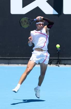 (240115) -- MELBOURNE, Jan. 15, 2024 -- Ben Shelton hits a return during the men s singles 1st round match between Ben Shelton of the United States and Roberto Bautista Agut of Spain at Australian Open tennis tournament in Melbourne, Australia, Jan. 15, 2024. ) (SP)AUSTRALIA-MELBOURNE-TENNIS-AUSTRALIAN OPEN MaxPing 
