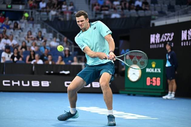 TENNIS AUSTRALIAN OPEN, Hubert Hurkacz of Poland returns during his first round match against Omar Jasika of Australia on Day 2 of the 2024 Australian Open at Melbourne Park in Melbourne, Monday, January 15, 2024. ( NO ARCHIVING, EDITORIAL USE ONLY, NO USE IN BOOKS WITHOUT CONSENT MELBOURNE VICTORIA AUSTRALIA  Copyright: xJAMESxROSSx 20240115001889273940