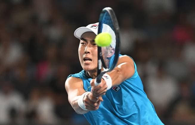 TENNIS AUSTRALIAN OPEN, Rinky Hijikata of Australia returns during his first round match against Jan-Lennard Struff of Germany on Day 2 of the 2024 Australian Open at Melbourne Park in Melbourne, Monday, January 15, 2024. ( NO ARCHIVING, EDITORIAL USE ONLY, NO USE IN BOOKS WITHOUT CONSENT MELBOURNE VICTORIA AUSTRALIA  Copyright: xLUKASxCOCHx 20240115001889285080