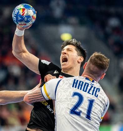 Sport Themen der Woche KW03 Sport Bilder des Tages HANDBALL - EHF EURO 2024 MANNHEIM,GERMANY,15.JAN.24 - HANDBALL - EHF Men s European Championship, EM, Europameisterschaft 2024, group stage, Bosnia and Herzegovina vs Georgia. Image shows Miriani Gavashelishvili (GEO) and Nedim Hadzic (BIH).  GEPAxpictures xEdgarxEisner