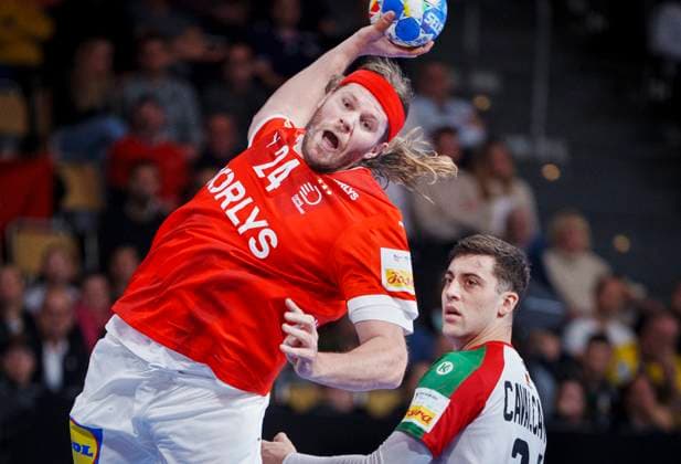 Sport Themen der Woche KW03 Sport Bilder des Tages Denmarks Mikkel Hansen and Portugals Alexandre Cavalcanti during the mens EHF Euro 2024 match between Denmark and the Portugal at the Olympiahalle in Munich, Germany, Monday January 15, 2024 , München Tyskland *** Denmarks Mikkel Hansen and Portugals Alexandre Cavalcanti during the mens EHF Euro 2024 match between Denmark and the Portugal at the Olympiahalle in Munich, Germany, Monday January 15, 2024 , Munich Germany  Copyright: Ritzau Scanpix LiselottexSabroex spdk20240115-212247-L
