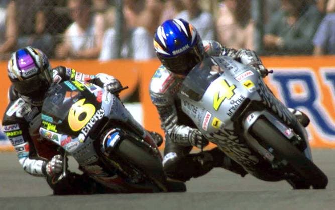 Motorcycling championship Japan s Masao Azuma, right, fightes for the first position with his compatriot Noburu Ueda during the 125-cc class race for the Dutch Grand Prix of the 1999 World motorcycling Championship at the Assen circuit, Netherlands, Saturday, June 26, 1999. (PanWorld Sports iPhoto.ca Don) (File size:4.61Mb) WMCNET06269902 Assen Holland EDITORIAL USE ONLY Copyright: xx WMCNET06269902 Donx WMCNET06269902