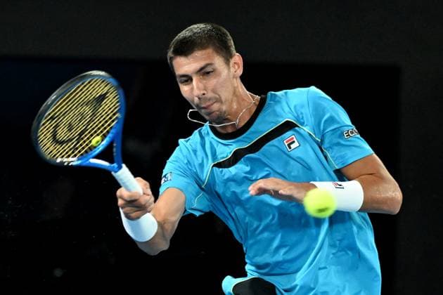 TENNIS AUSTRALIAN OPEN, Alexei Popyrin of Australia in action during his round 2 match against Novak Djokovic of Serbia on Day 4 of the 2024 Australian Open at Melbourne Park in Melbourne, Wednesday, January 17, 2024. ( NO ARCHIVING, EDITORIAL USE ONLY, NO USE IN BOOKS WITHOUT CONSENT MELBOURNE VICTORIA AUSTRALIA  Copyright: xJAMESxROSSx 20240117001890128861