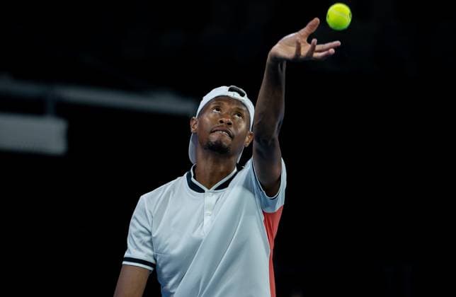 (240117) -- MELBOURNE, Jan. 17, 2024 -- Christopher Eubanks of the United States serves during the men s singles second round match between Andrey Rublev of Russia and Christopher Eubanks of the United States at the Australian Open tennis tournament in Melbourne, Australia on Jan. 17, 2024. (Photo by Xinhua) (SP)AUSTRALIA-MELBOURNE-TENNIS-AUSTRALIAN OPEN HuxJingchen 