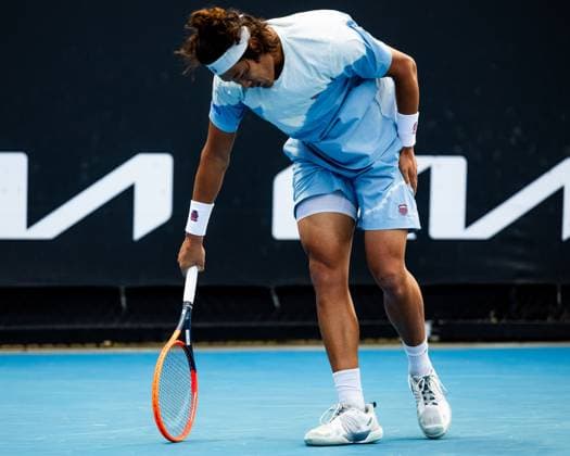 (240118) -- MELBOURNE, Jan. 18, 2024 -- Zhang Zhizhen of China reacts during the men s singles second round match Ugo Humbert of France and Zhang Zhizhen of China at the Australian Open tennis tournament in Melbourne, Australia, Jan. 18, 2024. (Photo by Xinhua) (SP)AUSTRALIA-MELBOURNE-TENNIS-AUSTRALIAN OPEN ChuxChen 